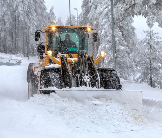 a man plowing snow
