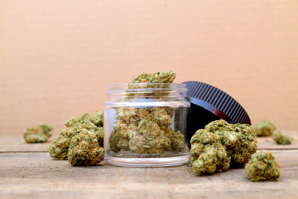 Marijuana in Open Jar Surrounded by Buds - Centered (Green Crack