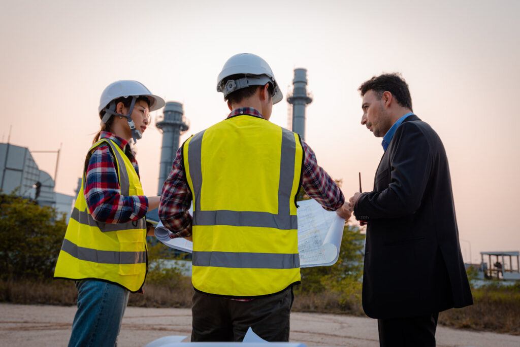 Businessman and engineer meeting and discuss project in working site, Teamwork project concept.