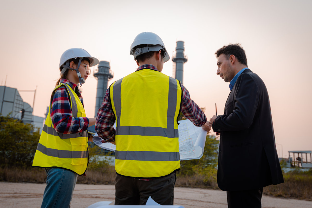 Businessman and engineer meeting and discuss project in working site, Teamwork project concept.